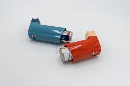 Photo for Seattle, WA USA - circa December 2022: Close up view of Albuterol and Flovent inhalers on a white background. - Royalty Free Image