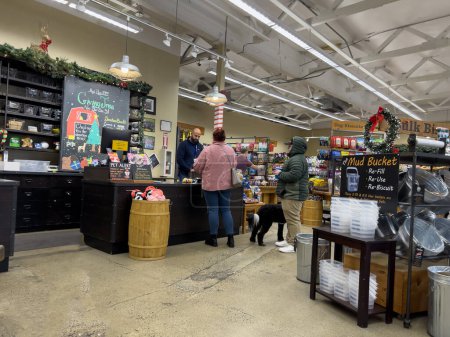 Photo for Mill Creek, WA USA - circa December 2022: Wide view of customers shopping inside a Mudbay pet shop. - Royalty Free Image