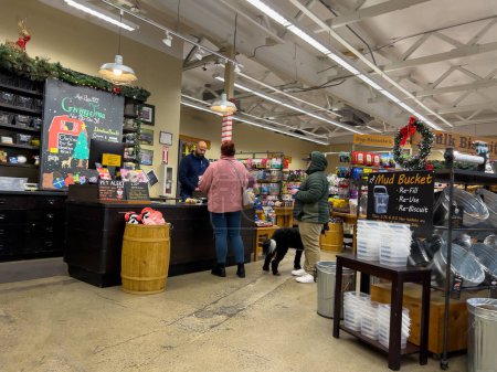 Photo for Mill Creek, WA USA - circa December 2022: Wide view of customers shopping inside a Mudbay pet shop. - Royalty Free Image