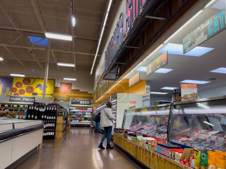 Photo for Mill Creek, WA USA - circa December 2022: Wide view of people shopping inside a Sprouts Farmers Market grocery store. - Royalty Free Image