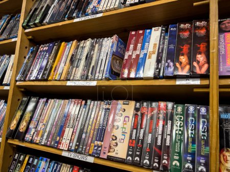 Foto de Redmond, WA USA - circa December 2022: Close up view of used dvds for sale inside a Half Price Bookstore. - Imagen libre de derechos