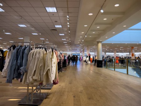 Photo for Lynnwood, WA USA - circa March 2023: Wide view of people shopping inside a Nordstrom clothing store in the Alderwood Mall. - Royalty Free Image
