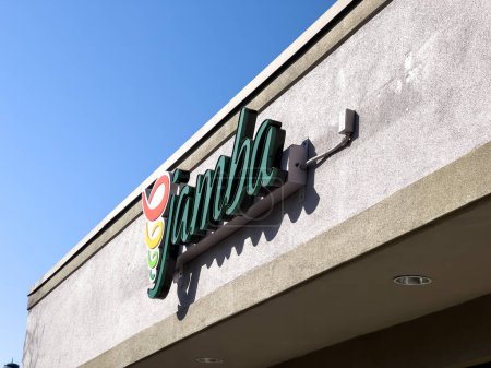 Photo for Redmond, WA USA - circa June 2023: Low angle view of the entrance to Jamba Juice on a bright, sunny day. - Royalty Free Image