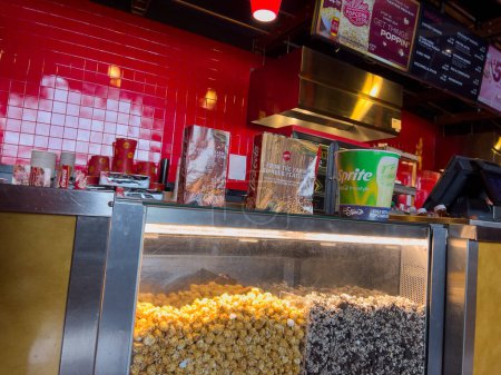 Photo for Lynnwood, WA USA - circa July 2023: Angled view of the concession stand counter inside an AMC movie theater. - Royalty Free Image