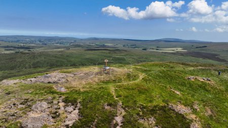 Photo for Aerial view of a Celtic Cross on the top of Slemish Mountain County Antrim Northern Ireland Slemish hill where St Patrick worked as a boy - Royalty Free Image