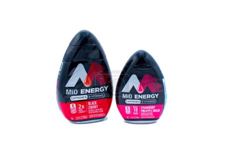 Photo for Ocala, FL USA November 2023 Mio energy liquid water enhancer with caffeine and vitamin B. Zero 0 calories Isolated on white background. Black cherry and pineapple strawberry flavors - Royalty Free Image