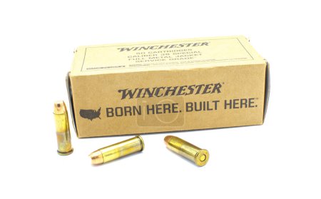 Photo for Ocala, FL November 23, 2023 Winchester brand born here built here 38 special service grade bullets ammo ammunition made in USA brown box packaging isolated on white background - Royalty Free Image