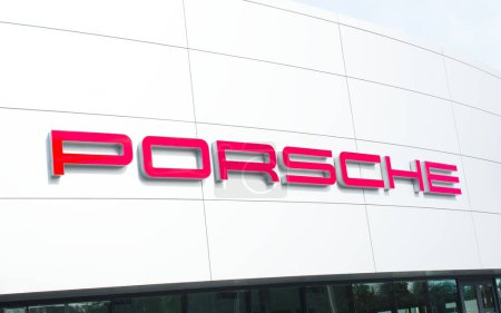 Photo for OCALA, FLORIDA USA - January 3, 2024  Porsche dealership with red logo on front of building . Florida - Royalty Free Image