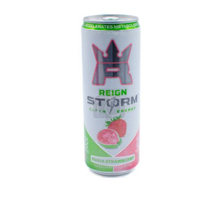 Photo for Ocala, FL March 22, 2024 Can of Reign Storm clean energy drink, accelerates metabolism. guava strawberry flavor. Green and red aluminum tin can isolated on white background - Royalty Free Image