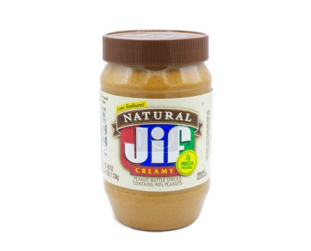 Photo for Ocala, Florida April 5, 2024 Image of a jar of natural Jif Creamy Peanut Butter. Jif is a brand of peanut butter made by The J.M. Smucker Company and debut in 1958 in crunchy and creamy - Royalty Free Image
