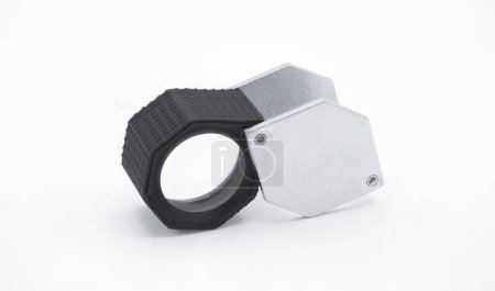 Photo for Large Hexagon Diamond Loupe eye lens pocket magnifier, Black, 10X used by jewelers, watch makers, gemstone inspecting for grading and clarity of stones. isolated on white background version 2 - Royalty Free Image