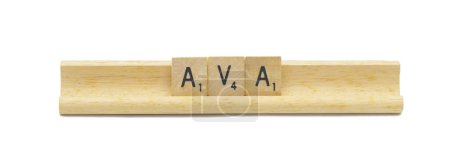 concept of popular newborn baby girl first name of AVA made with square wooden tile English alphabet letters with natural color and grain on a wood rack holder isolated on white background