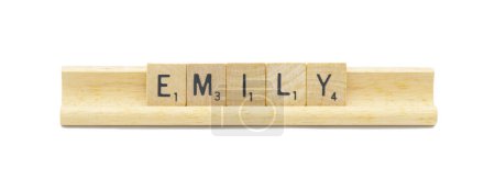 Miami, FL 4-18-24 popular baby girl first name of EMILY made with square wooden tile English alphabet letters with natural color and grain on a wood rack holder isolated on white background