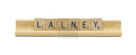 Miami, FL 4-18-24 popular baby girl first name of LAINEY made with square wooden tile English alphabet letters with natural color and grain on a wood rack holder isolated on white background