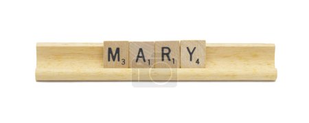 Miami, FL 4-18-24 popular baby girl first name of MARY made with square wooden tile English alphabet letters with natural color and grain on a wood rack holder isolated on white background