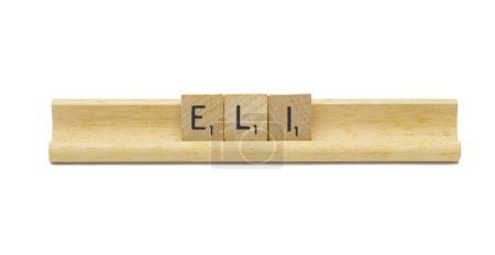 Miami, FL 4-18-24 popular baby boy first name of ELI made with square wooden tile English alphabet letters with natural color and grain on a wood rack holder isolated on white background