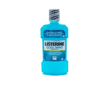 Photo for Ocala, Florida 4-26-2024 Listerine cool mint flavor mouthwash container isolated on white background. Listerine is a brand of antiseptic mouthwash product that kills germs that cause bad breath - Royalty Free Image
