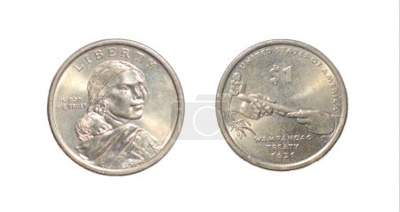 Photo for 2011 Sacagawea Dollar Coin WAMPANOAG TREATY 1621 carrying her young son, Jean Baptiste. reverse side with hands of Supreme Sachem Ousamequin Massasoit and John Carver, symbolically offering peace pipe - Royalty Free Image