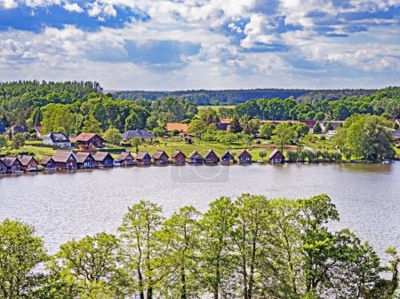 Téléchargez les photos : Aerial view of Mirower See with boathouses on the shore, Mecklenburg Lake District, Germany - en image libre de droit