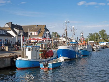 Photo for Vitte, Mecklenburg-Vorpommern, Germany - 29 June 2022: View of the harbor of Vitte on Hiddensee with colorful fishing boats - Royalty Free Image