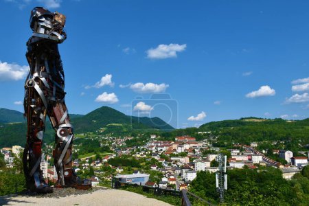 Photo for Trbovlje, Slovenia - June 28 2023: View of Trbovlje town and the Prometej statue above in Stajerska, Slovenia - Royalty Free Image