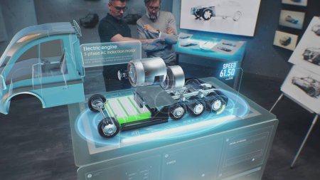 Photo for Two male automotive engineers create new eco-friendly truck with electric engine using futuristic virtual reality holographic model. 3D computer graphics of modern vehicle developing. VFX animation. - Royalty Free Image