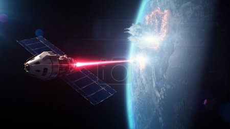 Téléchargez les photos : Animation 3D d'un satellite attaquant la planète Terre avec une arme laser depuis l'espace. Destruction dans le cosmos des armes nucléaires. La rivalité géopolitique. Menace spatiale d'agression nucléaire et de guerre. - en image libre de droit