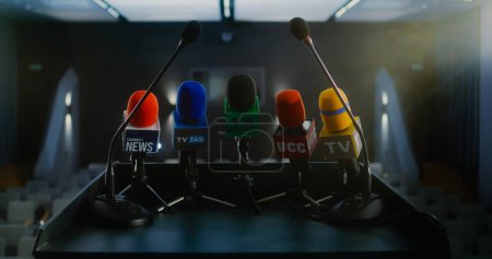 Photo for Speech tribune or debate stand with microphones for interview for media, television or breaking news. Empty conference hall in the government building with seats. Press conference and press campaign. - Royalty Free Image