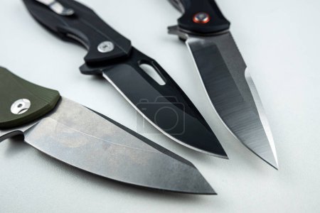 Photo for Three black tactical combat knives isolated on white. weapon - Royalty Free Image