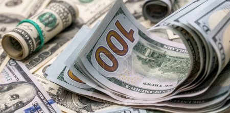 Téléchargez les photos : Contexte du papier américain dollar usd argent. Beaucoup de factures - en image libre de droit