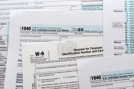 empty tax form blanks 1040 w9 W 9 federal income form as business concept. Time for tax