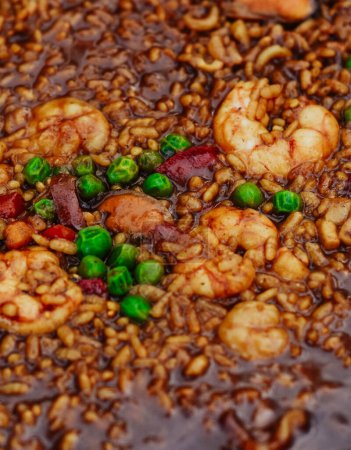 Photo for A typical Valencian seafood paella with rice - Royalty Free Image
