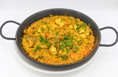 Photo for A typical Valencian seafood paella with rice - Royalty Free Image