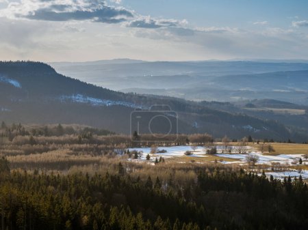 Photo for A view of a beautiful landscape of a mountain village in the mountains with trees in the background.. View of the Kodzko Valley.  It's spring in the valleys - Royalty Free Image