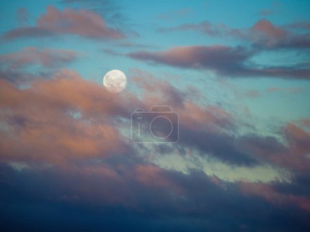 Photo for The setting moon in a cloudy sky. Morning - Royalty Free Image