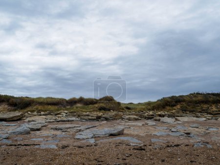 Photo for The sea coast between Audresselles and Ambleteuse. Waters of the English Channel - The La Manche Channel. France. - Royalty Free Image