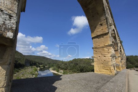 Photo for Details of ancient Roman Pont du Gard aqueduct and viaduct bridge, the highest of all ancient roman bridges, near to Nimes in the South of France. - Royalty Free Image