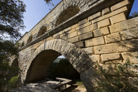 Photo for Details of ancient Roman Pont du Gard aqueduct and viaduct bridge, the highest of all ancient roman bridges, near to Nimes in the South of France. - Royalty Free Image