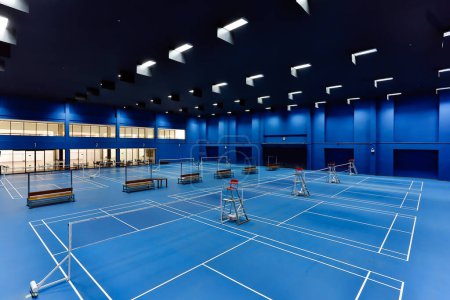 Photo for Bangkok, Thailand - February 10, 2015: Indoor badminton courts located in the luxury Rajpreuk Club in Bangkok, Thailand. - Royalty Free Image