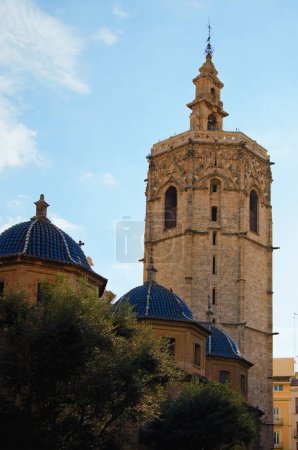 Photo for Close-up view the ancient tower of El Miguelete or El Micalet of the Valencia Cathedral. View of Valencia Cathedral or Basilica of the Assumption of Our Lady of Valencia. - Royalty Free Image