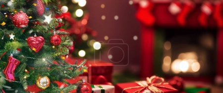 Photo for Beautiful red Christmas background with a decorated Christmas tree in the living room near the fireplace with lights and gifts. - Royalty Free Image