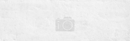 Foto de Imagen de fondo original ligera de un formato ultra ancho (banner) de una superficie con una textura de yeso o piedra natural clara. - Imagen libre de derechos