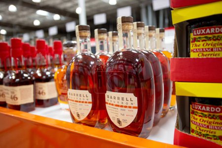 Foto de Los Angeles, California, United States - 03-01-2022: A view of several bottles of Barrell Bourbon, on display at a local grocery store. - Imagen libre de derechos