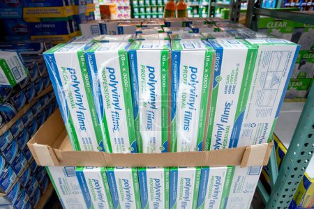 Téléchargez les photos : Los Angeles, California, United States - 05-20-2022: A view of several packages of Polyvinyl Films Professional all purpose food wrap, on display at a local big box grocery store. - en image libre de droit