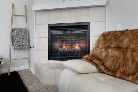 Photo for A view of a fireplace in a living room setting. - Royalty Free Image
