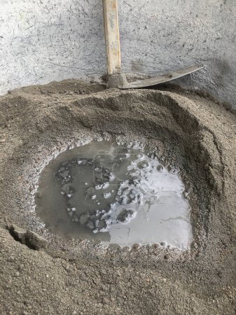 Construction concept, The mixing of stone, Cement, Sand together to make a strong concrete for building, Cement powder
