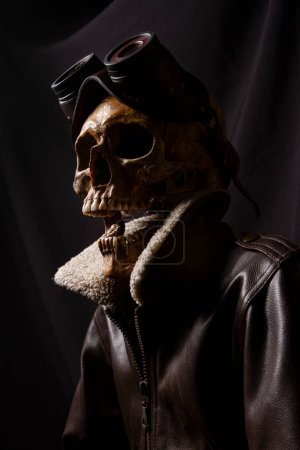 Photo for Skull with leather jacket and steampunk goggles. Aviator costum - Royalty Free Image