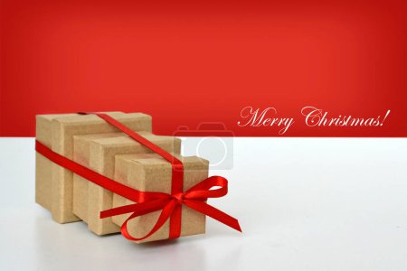 Photo for Gift boxes tied with red ribbon, christmas background - Royalty Free Image