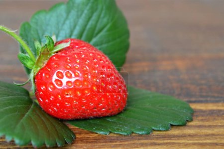 Photo for Fresh ripe strawberry on wooden background - Royalty Free Image