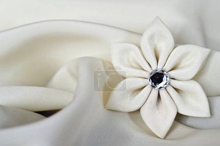 Photo for Flower decoration made of satin textile and diamond gem - Royalty Free Image